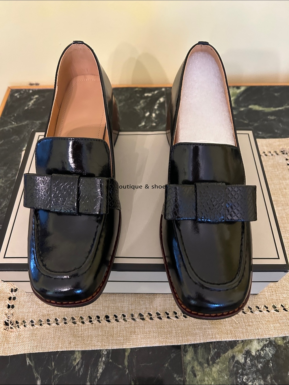 Classic Black Patent Leather Loafers with Textured Bow